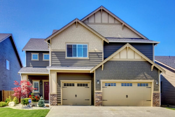 A large house with grey colour paint.