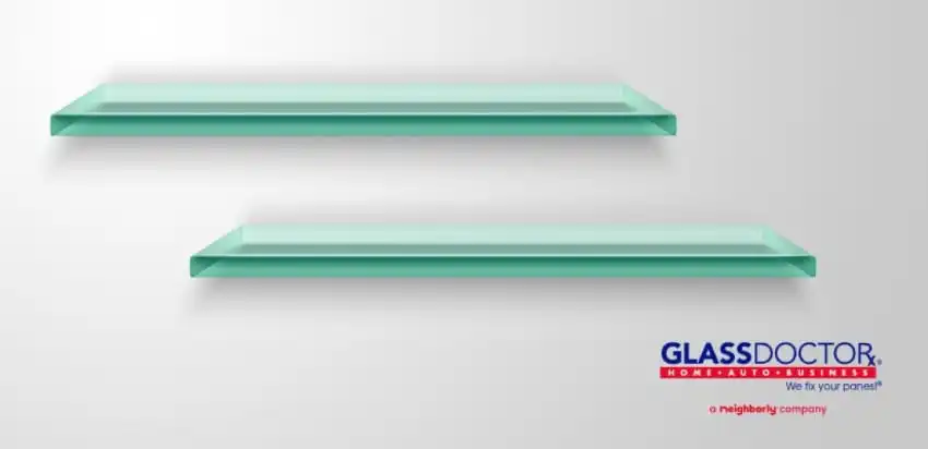 Two glass shelves on a wall