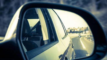Adjusting car mirrors for maximum visibility and safety