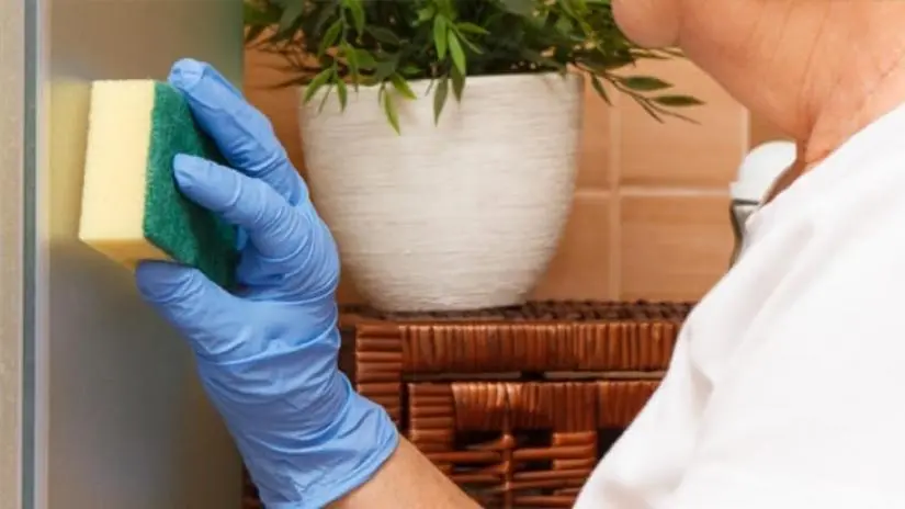 Removing limescale from shower door