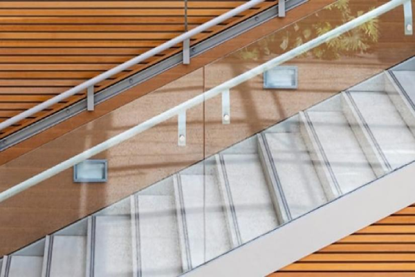 Scratches in tempered glass on staircase side panes.