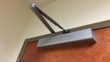Picture of a commercial door closer